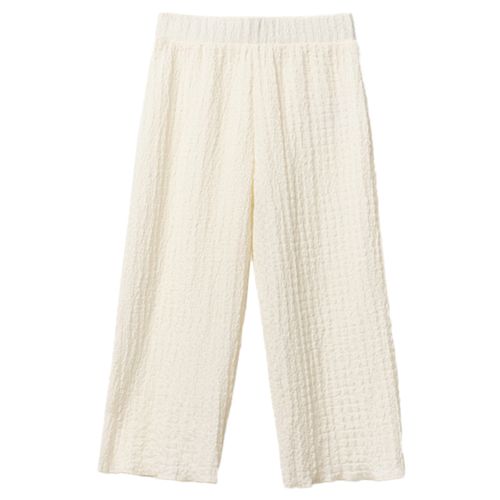 Pantalón beige con textura para niña