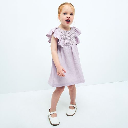 Vestido morado tejido para bebé niña