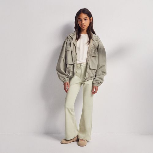 Jeans bootcut verde para niña
