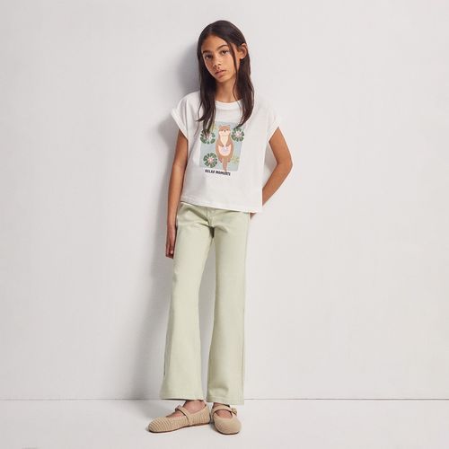 Camiseta ivory con estampado de nutria para niña