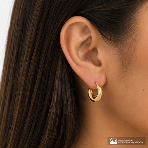 Argollas de metal en tono dorado para mujer