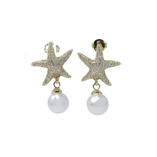 Aretes de estrella de mar de brass dorado para mujer