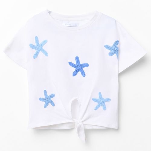 Camiseta blanca con estrellas de mar bordadas para niña