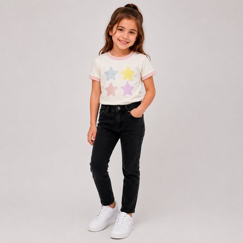 Camiseta blanca estampada de estrellas para niña