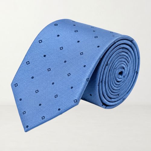 Corbata Oscar de la Renta celeste con diseño de puntos y rombos
