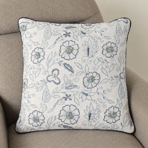 Cojín decorativo bordado azul